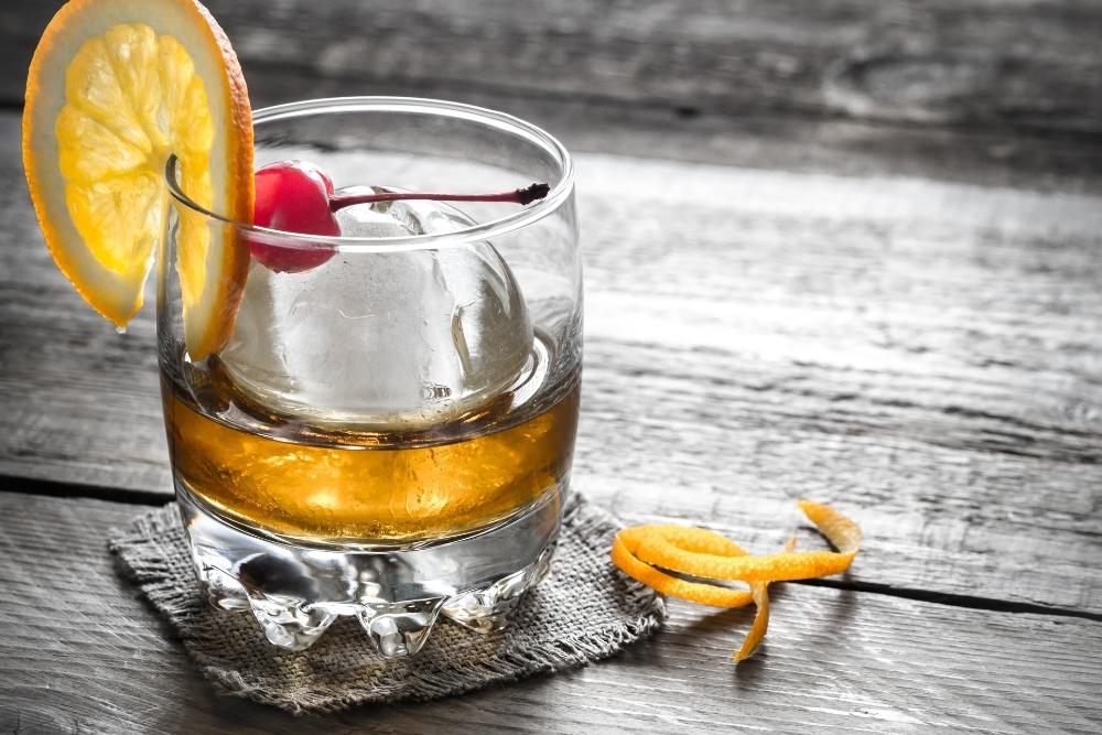 Classic Old Fashioned Cocktail with Orange and Cherry