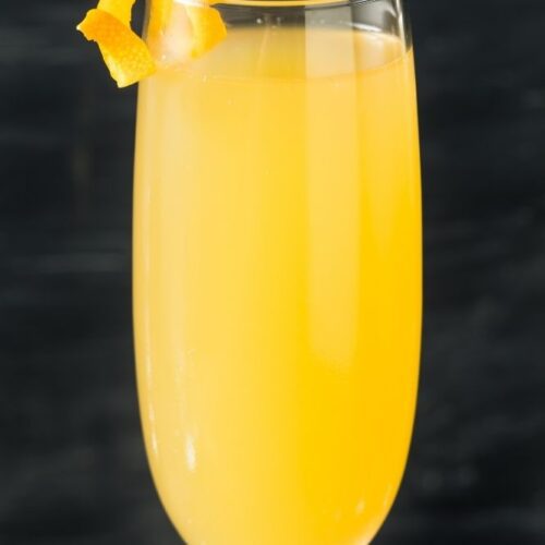 French 95 Drink with Orange Twist