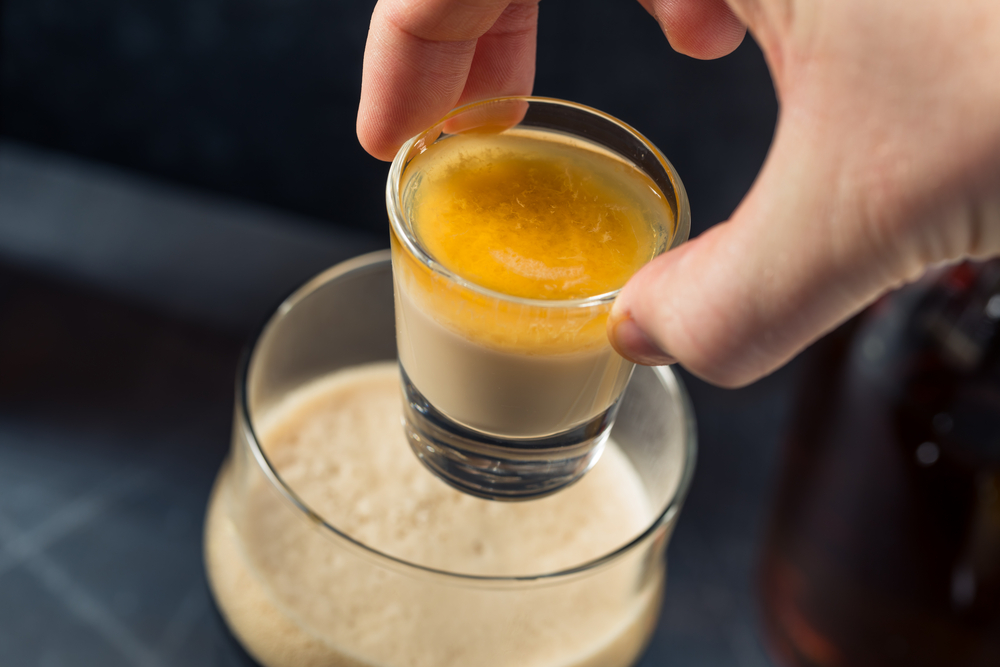 Irish Car Bomb Shot being Dropped in Guinness Glass