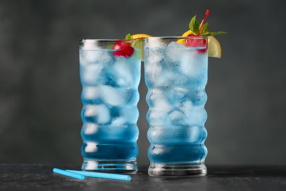 Two Blue Motorcycle Drinks with Lemon and Cherry