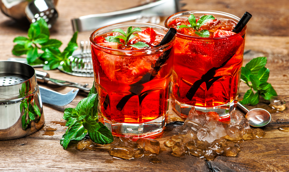 Two Strawberry Hennessy Cocktails with Mint Closeup