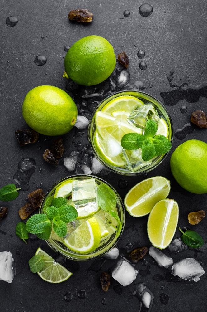 Looking Down at Two Mojito Drinks with Limes