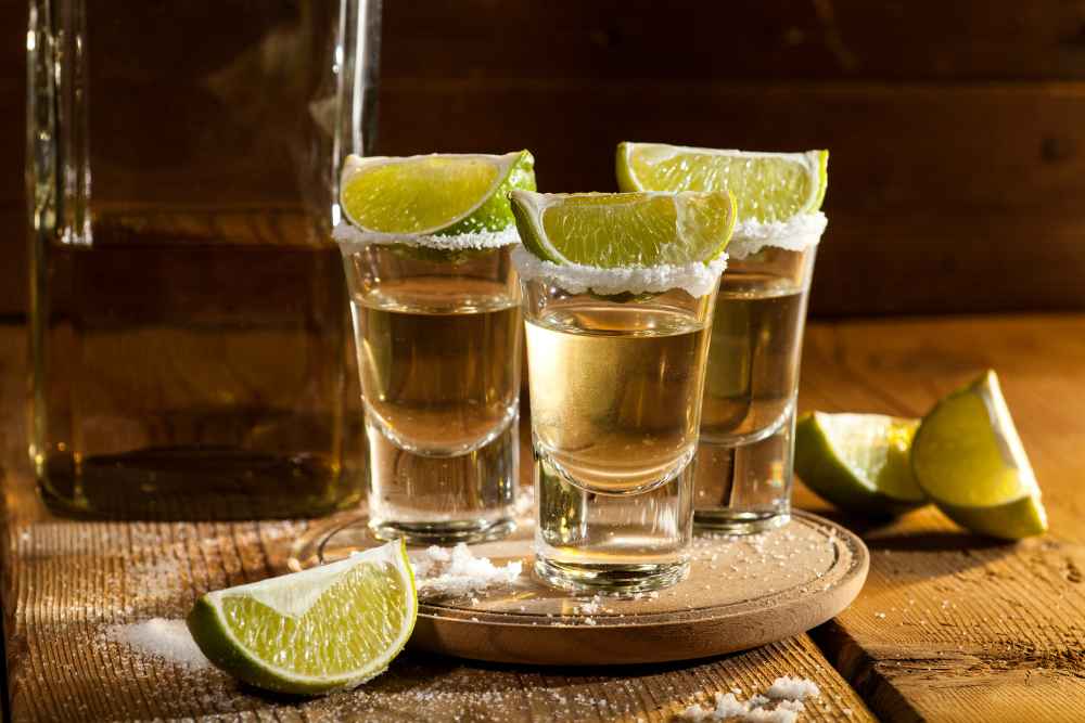 Three Tequila Shots with Lime and Salt