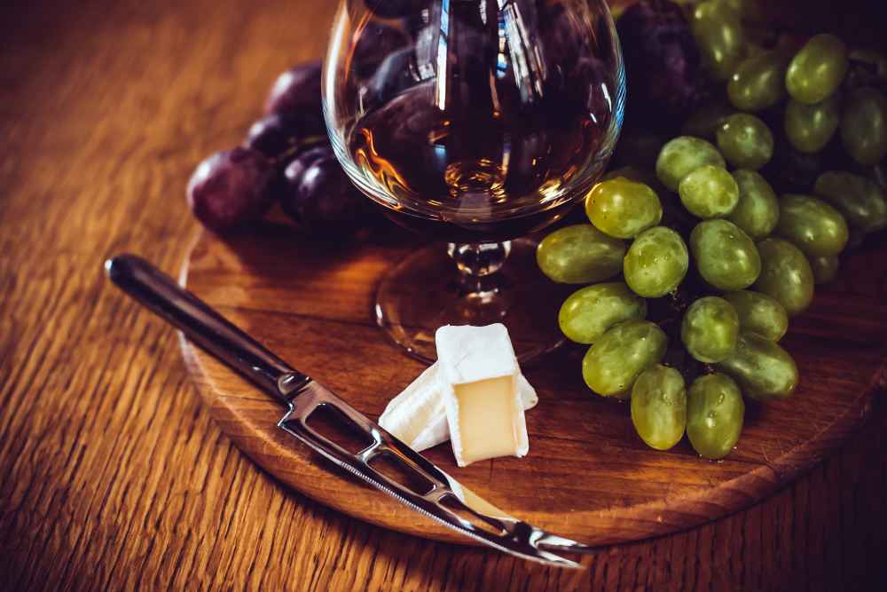 Brandy with Grapes and Cheese