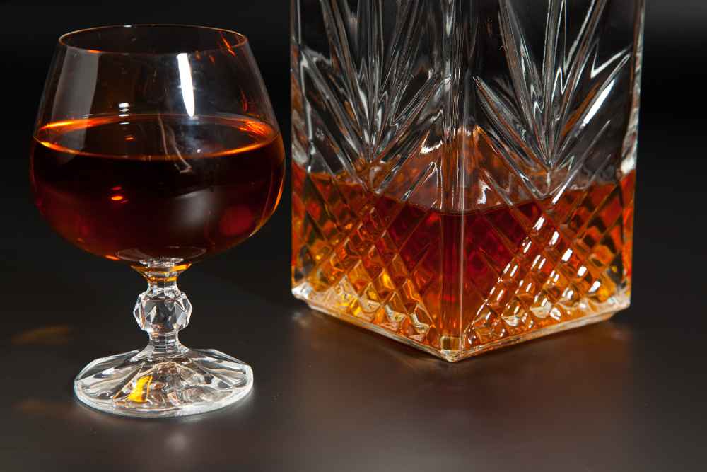 Glass of Cognac and Bottle